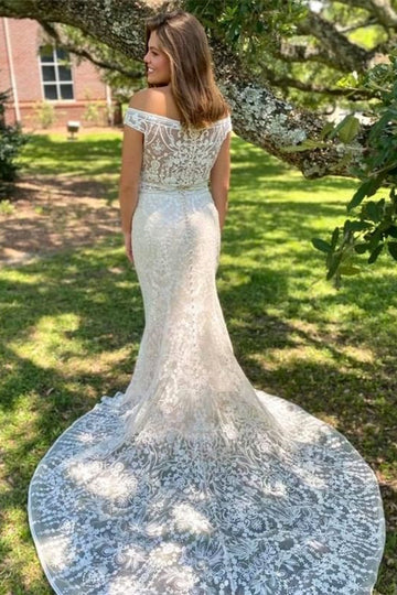 Vestido de novia sirena de encaje con hombros descubiertos